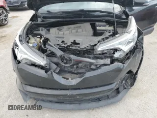 2018 Toyota C-HR XLE z VIN NMTKHMBX2JR036806, wystawiony jako Copart lot #53466255 z przebiegiem 66 915 mil mil oraz Szkoda całkowita • Salvage title. Historia ofert i sprzedaży dostępna na DreamBid. Obrazek 14.