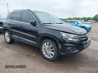 2012 Volkswagen Tiguan SE z VIN WVGBV7AX0CW558863, wystawiony jako IAAI lot #42285870 z przebiegiem 158 521 mil mil oraz . Historia ofert i sprzedaży dostępna na DreamBid. Obrazek 1.