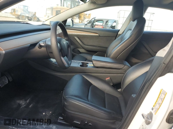 2022 Tesla Model 3 with VIN 5YJ3E1EA7NF184741, listed as a Copart auction lot 82487494 with 133,215 mi miles and Clean Title. Bid and sale history available at DreamBid. Image 7.
