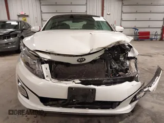 2015 Kia Optima EX z VIN 5XXGN4A7XFG502833, wystawiony jako IAAI lot #42193532 z przebiegiem 180 272 mil mil oraz . Historia ofert i sprzedaży dostępna na DreamBid. Obrazek 13.