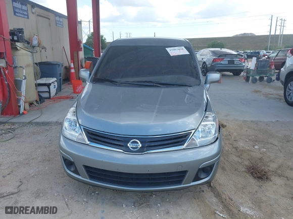 2011 Nissan Versa 1.8 SL with VIN 3N1BC1CP7BL446671, listed as a IAAI auction lot 42003858 with 96,939 mi miles. Bid and sale history available at carsss.com. Image 12.