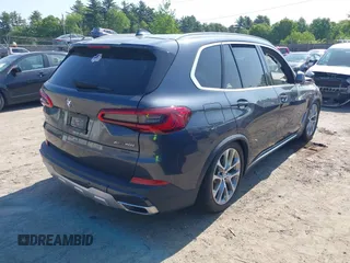 2020 BMW X5 xDrive40i with VIN 5UXCR6C06L9B16189, listed as a IAAI auction lot 42364103 with Not provided miles and . Bid and sale history available at DreamBid. Image 4.
