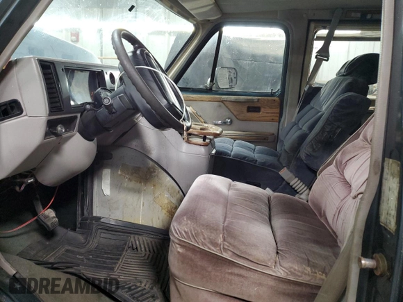 1995 Chevrolet Chevy Van z VIN 1GBEG25K2SF243949, wystawiony jako Copart lot #50422305 z przebiegiem 193 169 mil mil oraz Szkody całkowita. Historia ofert i sprzedaży dostępna na DreamBid. Obrazek 7.
