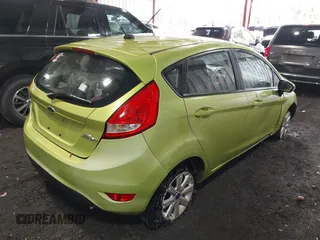 2013 Ford Fiesta SE with VIN 3FADP4EJ6DM150399, listed as a IAAI auction lot 41734742 with 139,056 mi miles. Bid and sale history available at carsss.com. Image 4.