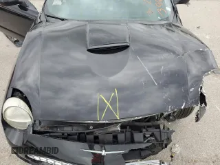 2003 Ford Thunderbird Deluxe z VIN 1FAHP60AX3Y101570, wystawiony jako Copart lot #51546865 z przebiegiem 108 736 mil mil oraz Szkoda całkowita • Salvage title. Historia ofert i sprzedaży dostępna na DreamBid. Obrazek 11.