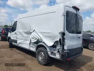 2018 Ford Transit Cargo with VIN 1FTYR2CG9JKA51600, listed as a IAAI auction lot 42026514 with 57,484 mi miles and . Bid and sale history available at DreamBid. Image 3.