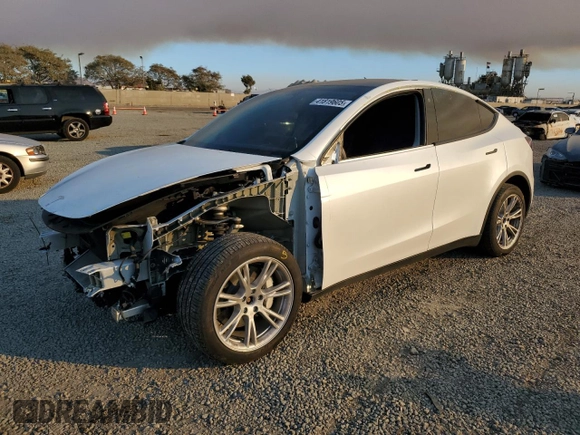 2023 Tesla Model Y Long Range with VIN 7SAYGDEE9PA129876, listed as a Copart auction lot 41819605 with 36,110 mi miles and Salvage Title. Bid and sale history available at DreamBid. Image 1.