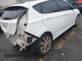 2014 Hyundai Accent SE with VIN KMHCU5AE8EU145629, listed as a IAAI auction lot 41497848 with 134,919 mi miles. Bid and sale history available at carsss.com. Image 12.
