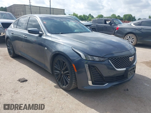 2021 Cadillac CT5 Premium Luxury z VIN 1G6DN5RK9M0111997, wystawiony jako IAAI lot #42715545 z przebiegiem 78 769 mil mil oraz . Historia ofert i sprzedaży dostępna na DreamBid. Obrazek 1.