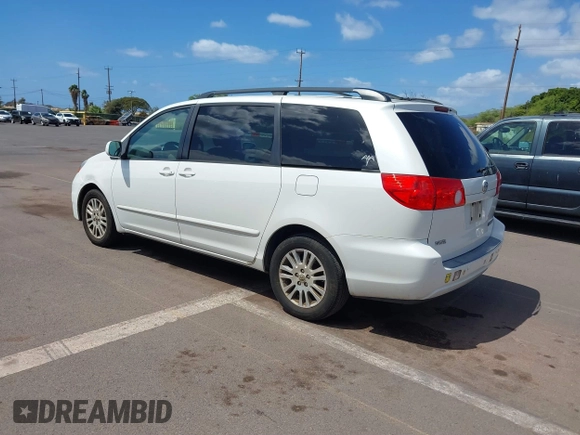 2010 Toyota Sienna XLE with VIN 5TDYK4CC7AS291119, listed as a IAAI auction lot 41742917 with 201,590 mi miles. Bid and sale history available at carsss.com. Image 3.