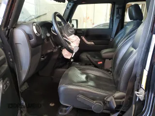2017 Jeep Wrangler Unlimited Sahara with VIN 1C4BJWEG9HL698536, listed as a Copart auction lot 50700435 with 77,175 mi miles and Salvage Title. Bid and sale history available at carsss.com. Image 7.