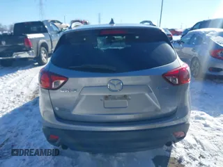 2013 Mazda CX-5 Touring with VIN JM3KE2CE7D0129623, listed as a IAAI auction lot 41344623 with 147,025 mi miles. Bid and sale history available at carsss.com. Image 16.