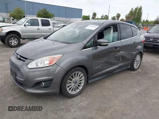 2013 Ford C-Max SEL z VIN 1FADP5BU2DL543029, wystawiony jako IAAI lot #42115325 z przebiegiem 131 855 mil mil oraz . Historia ofert i sprzedaży dostępna na DreamBid. Obrazek 2.