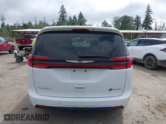 2023 Chrysler Pacifica Hybrid Touring L with VIN 2C4RC1L77PR541513, listed as a IAAI auction lot 42433421 with 53,979 mi miles and . Bid and sale history available at DreamBid. Image 17.
