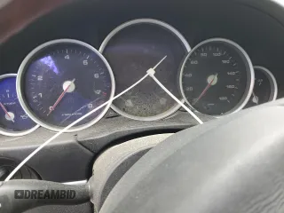 2004 Porsche Cayenne Turbo z VIN WP1AC29P44LA93499, wystawiony jako Copart lot #56761105 z przebiegiem Nie podano mil oraz Szkoda całkowita • Salvage title. Historia ofert i sprzedaży dostępna na DreamBid. Obrazek 9.