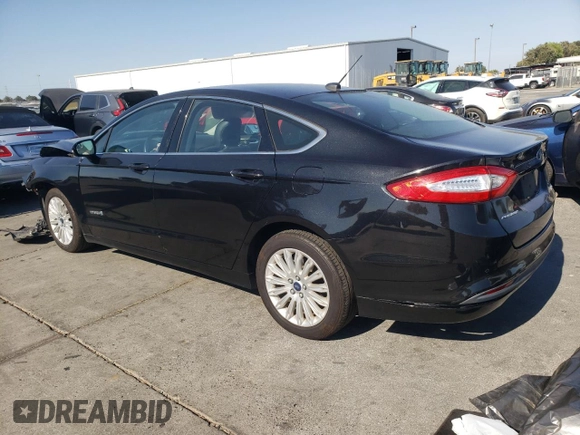 2013 Ford Fusion SE Hybrid with VIN 3FA6P0LU7DR363136, listed as a Copart auction lot 64764315 with 173,575 mi miles and Salvage title. Bid and sale history available at DreamBid. Image 2.