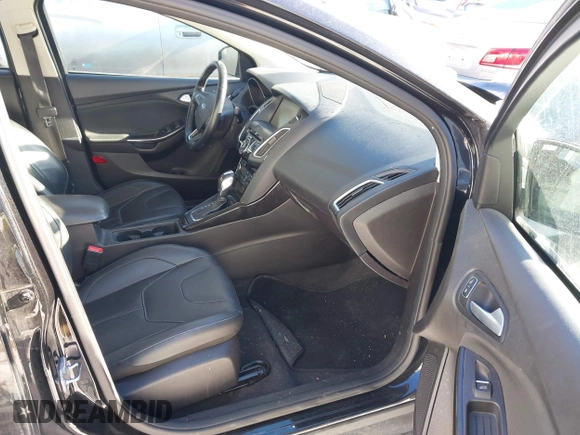 2015 Ford Focus Titanium with VIN 1FADP3J22FL323185, listed as a IAAI auction lot 41461154 with 125,477 mi miles and . Bid and sale history available at carsss.com. Image 5.