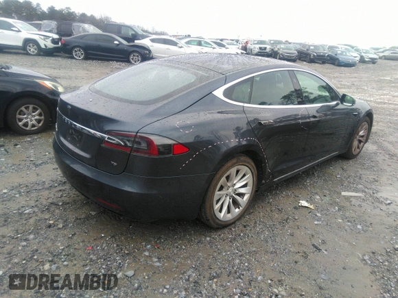 2016 Tesla Model S 70 with VIN 5YJSA1E13GF174542, listed as a IAAI auction lot 41169279 with 72,691 mi miles and . Bid and sale history available at DreamBid. Image 4.