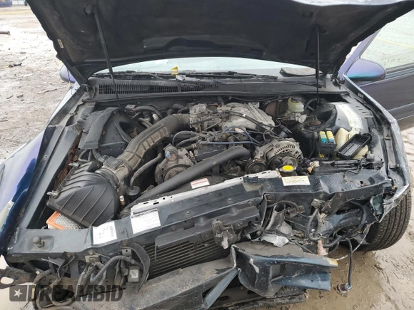 1996 Ford Thunderbird LX z VIN 1FALP6244TH118429, wystawiony jako Copart lot #47677935 z przebiegiem 167 726 mil mil oraz Szkoda całkowita • Salvage title. Historia ofert i sprzedaży dostępna na DreamBid. Obrazek 12.