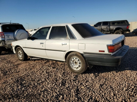1989 Toyota Camry z VIN 4T1SV24E5KU019985, wystawiony jako Copart lot #81200104 z przebiegiem 207 103 mil mil oraz Szkoda całkowita • Salvage title. Historia ofert i sprzedaży dostępna na DreamBid. Obrazek 2.
