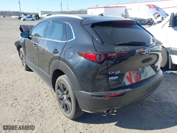 2022 Mazda CX-30 2.5 Turbo Premium Package with VIN 3MVDMBDY0NM459310, listed as a IAAI auction lot 41614937 with 32,514 mi miles. Bid and sale history available at carsss.com. Image 3.