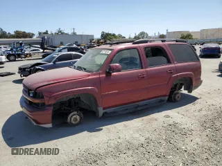 2004 Chevrolet Tahoe Z71 with VIN 1GNEK13T84R322308, listed as a Copart auction lot 60718545 with 158,599 mi miles and Salvage title. Bid and sale history available at DreamBid. Image 1.