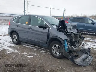 2015 Honda CR-V LX with VIN 2HKRM4H3XFH619055, listed as a IAAI auction lot 40989227 with 113,332 mi miles and . Bid and sale history available at DreamBid. Image 1.