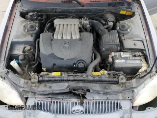 2001 Hyundai Sonata GLS with VIN KMHWF35VX1A372516, listed as a Copart auction lot 76357494 with 170,642 mi miles and Salvage Title. Bid and sale history available at carsss.com. Image 11.