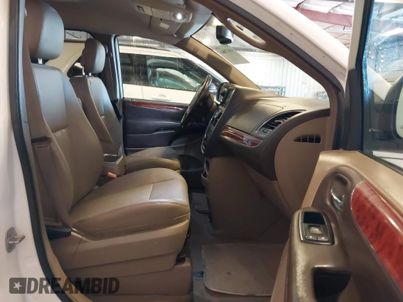 2015 Chrysler Town & Country Touring with VIN 2C4RC1BG9FR626482, listed as a IAAI auction lot 41879865 with 129,694 mi miles and . Bid and sale history available at DreamBid. Image 5.