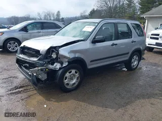 2005 Honda CR-V LX with VIN JHLRD78535C042479, listed as a IAAI auction lot 41682963 with 216,777 mi miles. Bid and sale history available at carsss.com. Image 2.
