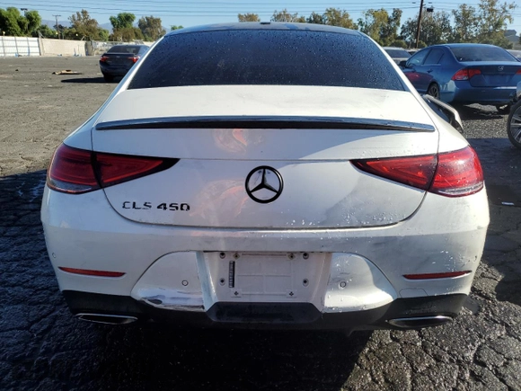 2019 Mercedes-Benz CLS with VIN WDD2J5JB7KA034975, listed as a Copart auction lot 76060893 with 58,506 mi miles. Bid and sale history available at carsss.com. Image 6.