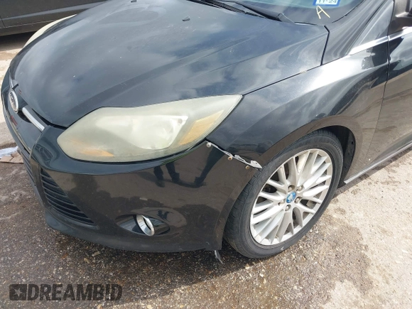 2013 Ford Focus Titanium with VIN 1FADP3J23DL152122, listed as a IAAI auction lot 41935180 with 175,065 mi miles and . Bid and sale history available at carsss.com. Image 6.