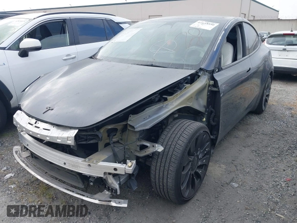 2023 Tesla Model Y Performance z VIN 7SAYGDEF6PF774965, wystawiony jako IAAI lot #41655550 z przebiegiem 33 824 mil mil oraz . Historia ofert i sprzedaży dostępna na DreamBid. Obrazek 2.