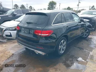 2016 Mercedes-Benz GLC with VIN WDC0G4KB9GF085925, listed as a IAAI auction lot 40804297 with 77,297 mi miles. Bid and sale history available at carsss.com. Image 4.