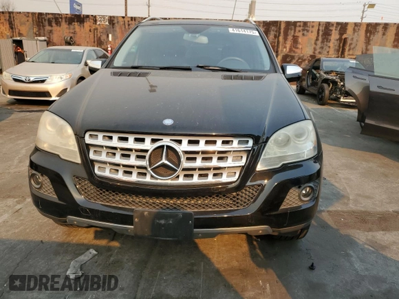 2009 Mercedes-Benz M 3.5L with VIN 4JGBB56E49A525018, listed as a Copart auction lot 41614175 with 154,428 mi miles and Salvage Title. Bid and sale history available at carsss.com. Image 5.
