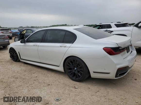 2021 BMW 7 Series 740i with VIN WBA7T2C06MCF88813, listed as a Copart auction lot 49589555 with 60,802 mi miles and Salvage title. Bid and sale history available at DreamBid. Image 2.