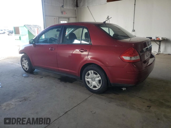 2011 Nissan Versa S with VIN 3N1BC1AP7BL468978, listed as a Copart auction lot 51956355 with 131,307 mi miles and Salvage title. Bid and sale history available at DreamBid. Image 2.