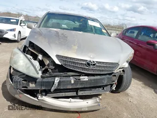 2003 Toyota Camry LE with VIN 4T1BE32KX3U123873, listed as a IAAI auction lot 42085492 with 166,901 mi miles and . Bid and sale history available at DreamBid. Image 12.