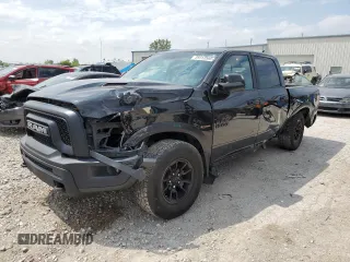 2018 Ram 1500 Rebel with VIN 1C6RR7YT7JS160331, listed as a Copart auction lot 59312585 with 105,299 mi miles and Salvage title. Bid and sale history available at DreamBid. Image 1.