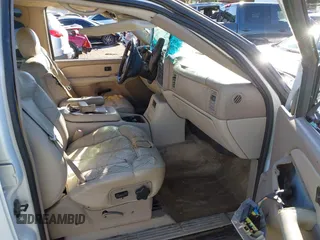 2002 Chevrolet Suburban LT with VIN 1GNFK16Z52J166390, listed as a IAAI auction lot 40688021 with 319,381 mi miles. Bid and sale history available at carsss.com. Image 5.