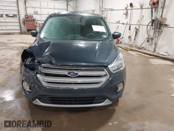 2019 Ford Escape SE z VIN 1FMCU9GD2KUA31904, wystawiony jako IAAI lot #41843341 z przebiegiem 125 605 mil mil oraz . Historia ofert i sprzedaży dostępna na DreamBid. Obrazek 12.