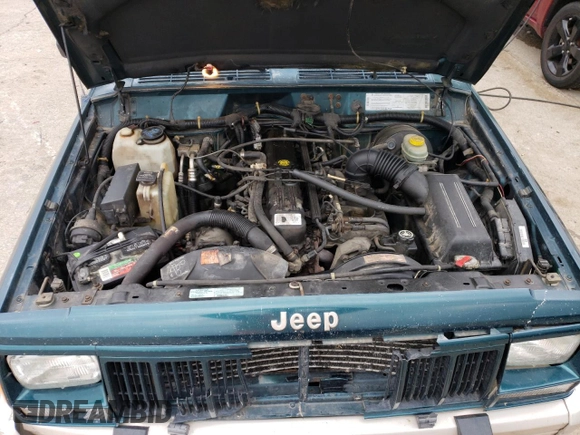 1995 Jeep Cherokee Country with VIN 1J4FJ78S3SL557728, listed as a Copart auction lot 55109494 with 203,347 mi miles and Salvage Title. Bid and sale history available at carsss.com. Image 12.