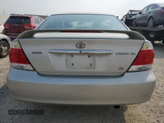2006 Toyota Camry LE z VIN 4T1BF30K66U115872, wystawiony jako Copart lot #60526695 z przebiegiem 164 561 mil mil oraz Szkoda całkowita • Salvage title. Historia ofert i sprzedaży dostępna na DreamBid. Obrazek 6.