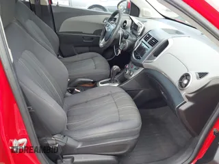 2013 Chevrolet Sonic LT with VIN 1G1JC6SHXD4172738, listed as a IAAI auction lot 41872916 with 105,829 mi miles. Bid and sale history available at carsss.com. Image 5.
