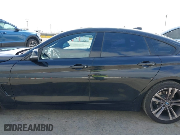 2015 BMW 4 Series 428i z VIN WBA4A9C5XFD416873, wystawiony jako IAAI lot #42108645 z przebiegiem 93 433 mil mil oraz . Historia ofert i sprzedaży dostępna na DreamBid. Obrazek 15.