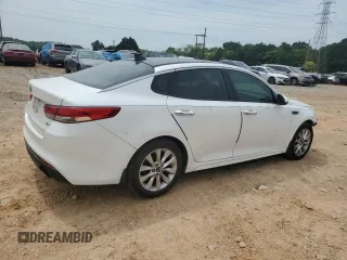 2016 Kia Optima EX with VIN 5XXGU4L36GG097679, listed as a Copart auction lot 60231295 with 110,599 mi miles and Salvage title. Bid and sale history available at DreamBid. Image 3.
