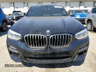 2019 BMW X4 M40i z VIN 5UXUJ5C51KLJ64361, wystawiony jako Copart lot #48356605 z przebiegiem 94 815 mil mil oraz Czysty tytuł • Clean title. Historia ofert i sprzedaży dostępna na DreamBid. Obrazek 5.