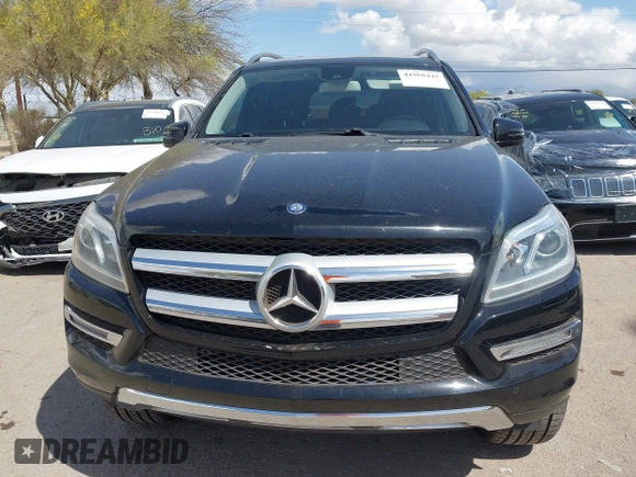 2014 Mercedes-Benz GL 450 z VIN 4JGDF7CE1EA342408, wystawiony jako IAAI lot #41968441 z przebiegiem 120 459 mil mil oraz . Historia ofert i sprzedaży dostępna na DreamBid. Obrazek 12.
