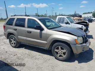 2005 Jeep Grand Cherokee Laredo with VIN 1J4HS48NX5C656582, listed as a IAAI auction lot 42079746 with Not Provided miles and . Bid and sale history available at DreamBid. Image 13.