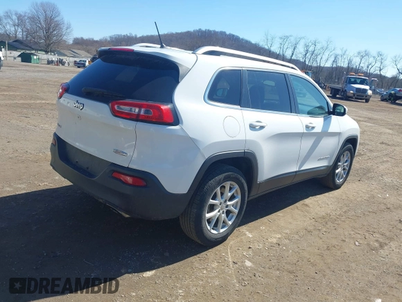 2015 Jeep Cherokee Latitude with VIN 1C4PJMCS8FW624375, listed as a IAAI auction lot 41848679 with 148,130 mi miles and . Bid and sale history available at DreamBid. Image 4.